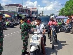 Danramil,416-05/Muaro Tebo Bagi-Bagi Masker Kemasyarakat Dan Parapengendara.