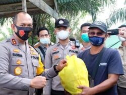 Antisipasi Lonjakan Pasca Hari Raya, Polda Jambi Bagikan 250.000 Masker dan 4.000 sweb antigen.