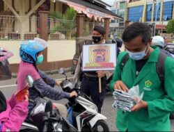 Sambut HUT Bhayangkara ke 75, Polres Lhokseumawe Bersama Mahasiswa KKN Unimal Bagikan Masker