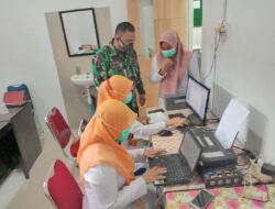 Babinsa Koramil 07/Mrm Kodim 0103/Aceh Utara Dampingi Petugas kesehatan Covid-19