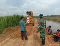 Anggota Satgas TMMD Terus Kebut Pelaksanaan Pengerasan Jalan Penghubung