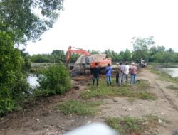 Alat berat Excavator Mewarnai Kegiatan Satgas TMMD Ke 112 Kodim 0103/Aceh Utara.