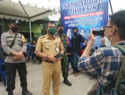 Bhabinkamtibmas Lakukan Pemantauan Atas Giat Vaksinasi Massal DPC Partai Demokrat