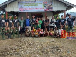 Satgas Pamtas RI-PNG Yonif 711/Raksatama Melaksanakan Karya Bakti Bersama Warga