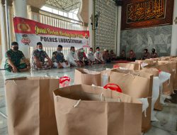 Program Jumat Berkah, Polres Lhokseumawe Santuni Puluhan Anak Yatim Piatu di Mesjid Baiturrahim