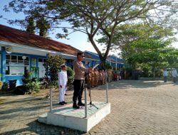 Kapolsek Ujung Loe Jadi Irup di SMAN 9, Sampaikan Amanat Kapolres